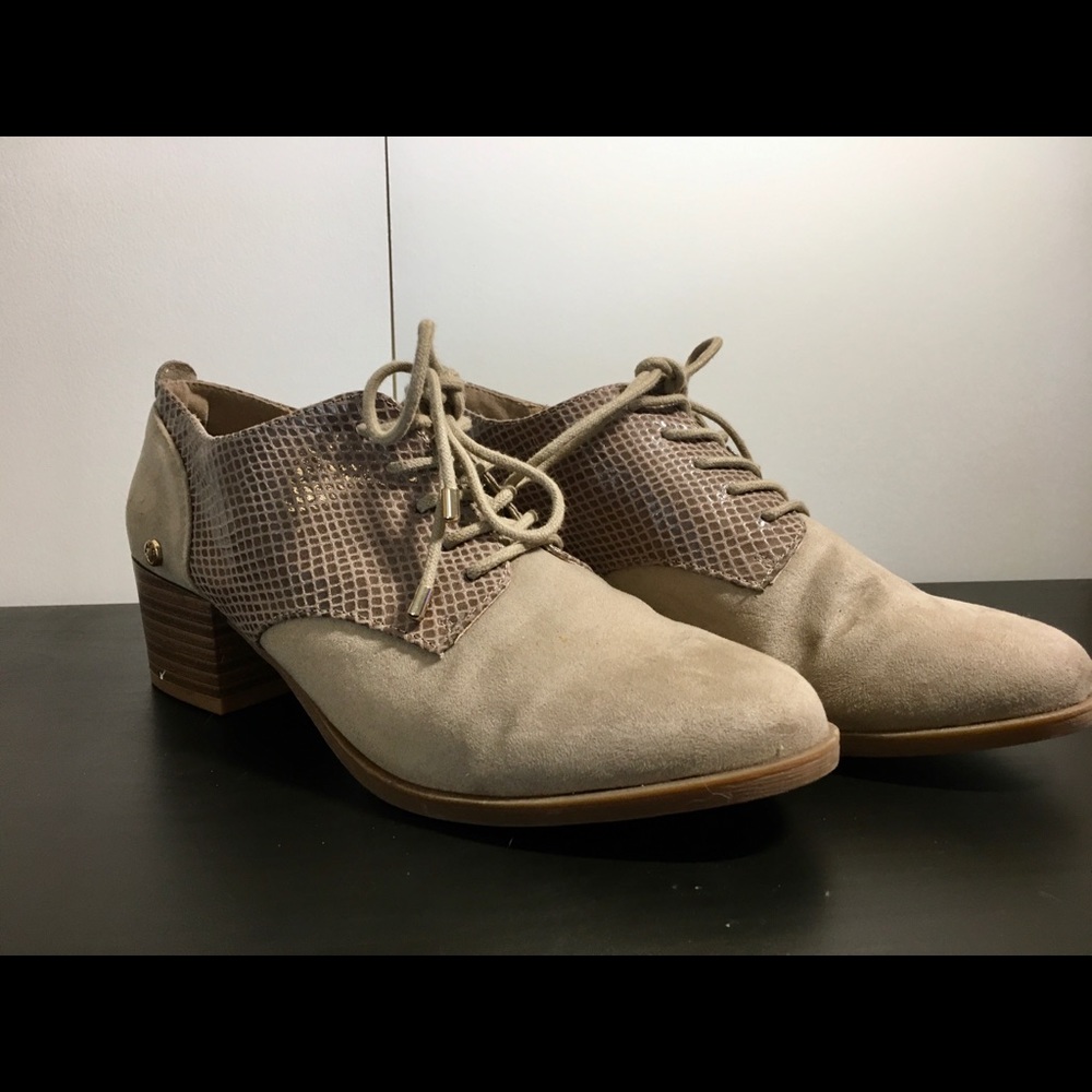 Heeled lace up booties